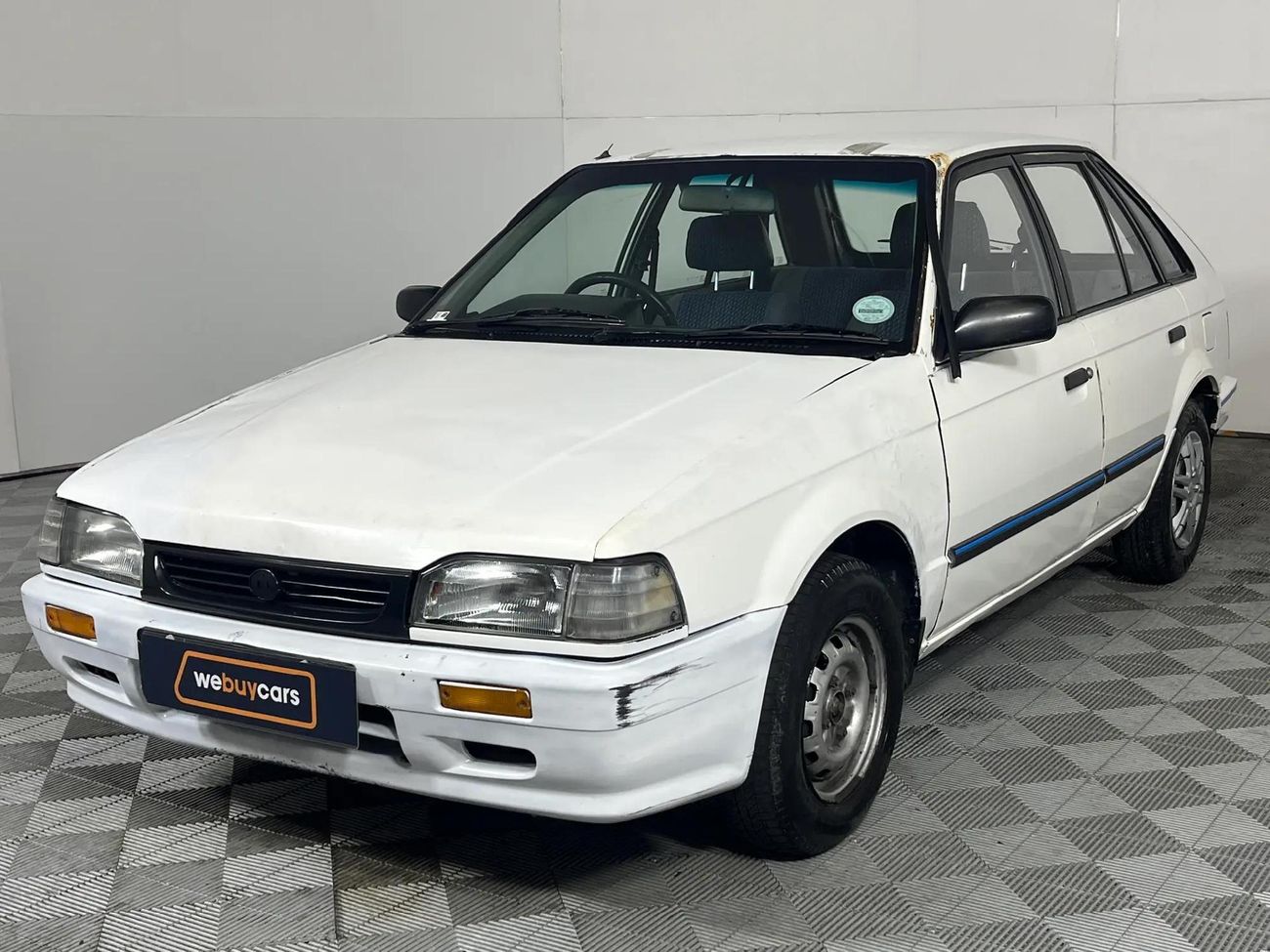 1992-Mazda-323-13-L-Hatch.jpg?