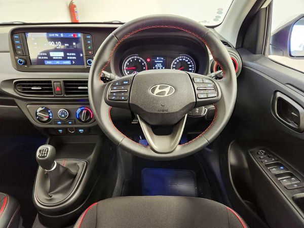 2025-Hyundai-Grand-i10-10-Fluid image:12