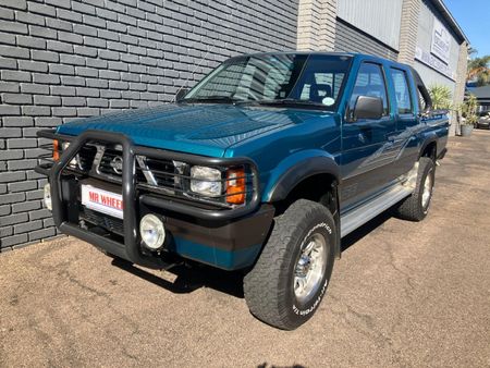 1997-Nissan-Hardbody-30-4x4-SE-Double-Cab_2