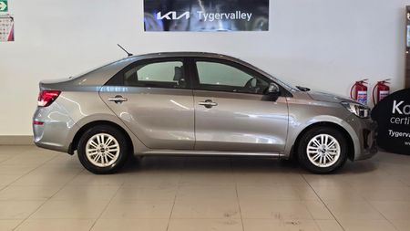 2024-Kia-Pegas-14-EX-Auto_1