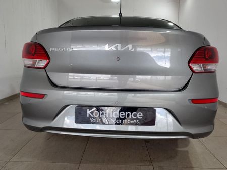 2024-Kia-Pegas-14-EX-Auto_10