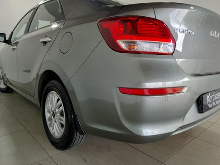 2024-Kia-Pegas-14-EX-Auto_11