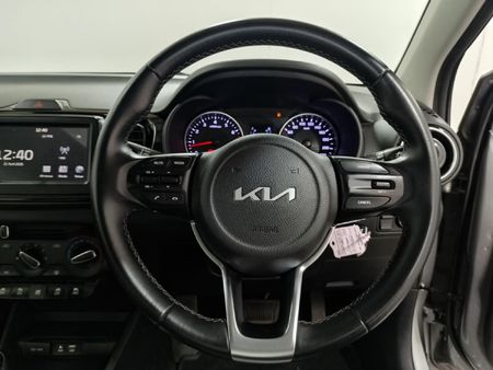 2024-Kia-Pegas-14-EX-Auto_21