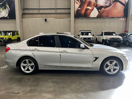 2014-BMW-3-Series-320i-Modern-Auto_1