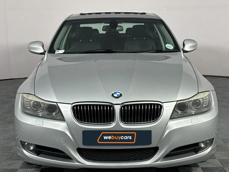 2011-BMW-3-Series-323i-Innovation-Auto_13