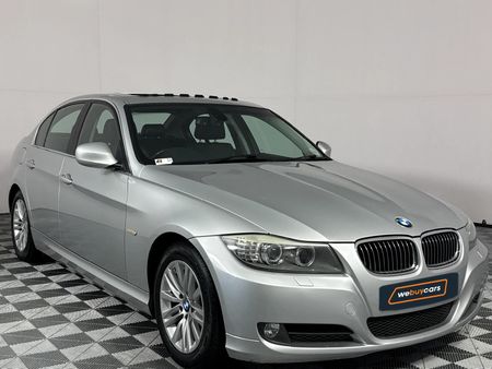 2011-BMW-3-Series-323i-Innovation-Auto_14