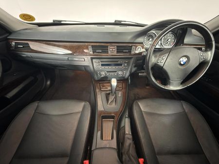 2011-BMW-3-Series-323i-Innovation-Auto_1
