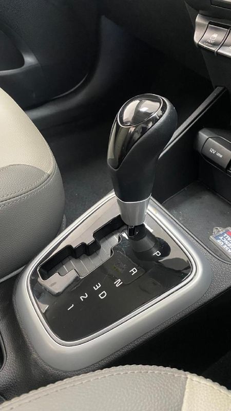 2025-Kia-Pegas-14-EX-Auto_9