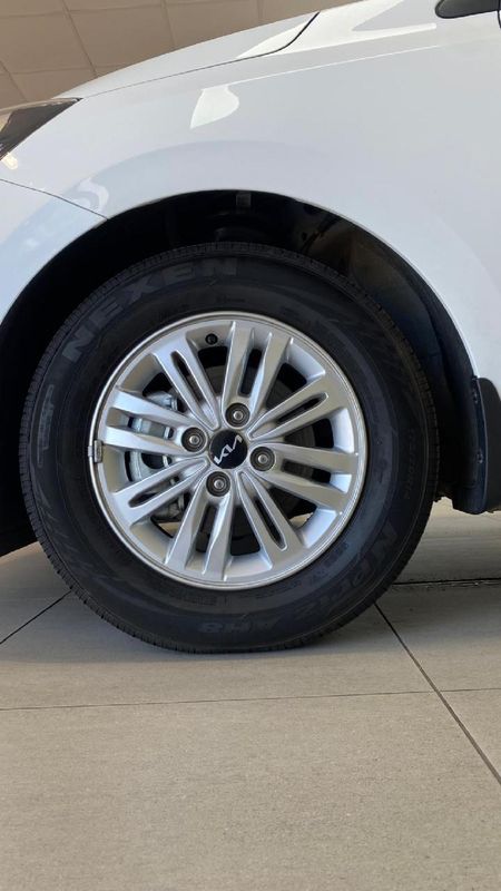 2025-Kia-Pegas-14-EX-Auto_18