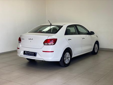 2025-Kia-Pegas-14-EX-Auto_3