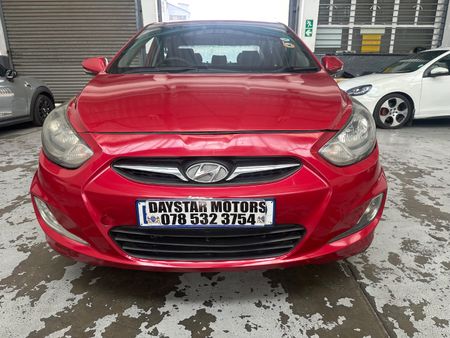 2013-Hyundai-Accent-16-GLS-Fluid_8