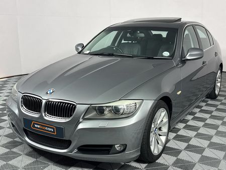 2010-BMW-3-Series-323i-Innovation-Auto_0