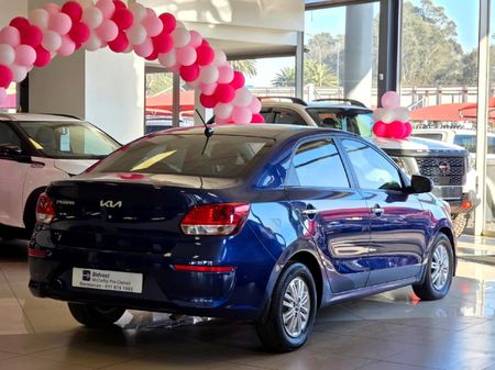 2024-Kia-Pegas-14-EX-Auto_23