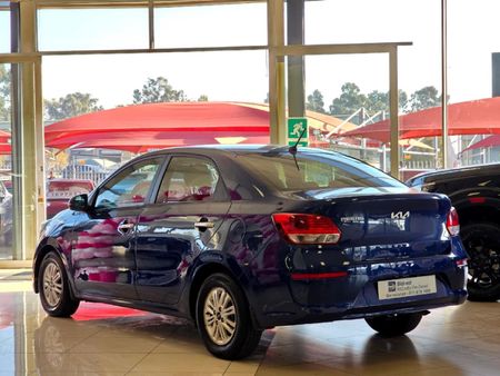 2024-Kia-Pegas-14-EX-Auto_24