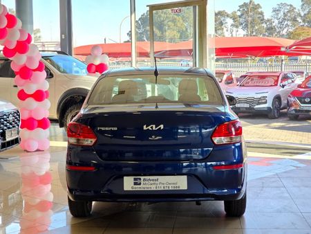 2024-Kia-Pegas-14-EX-Auto_25