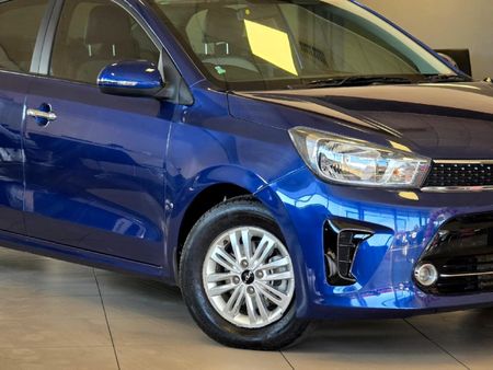 2024-Kia-Pegas-14-EX-Auto_26