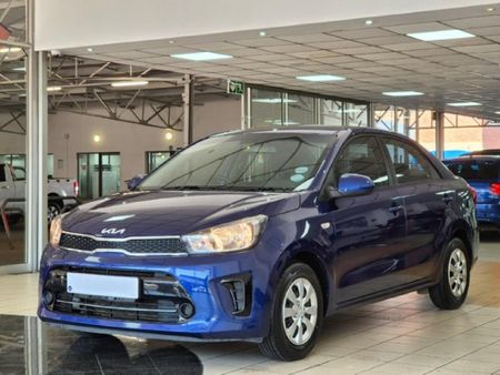 2024-Kia-Pegas-14-EX-Auto_4