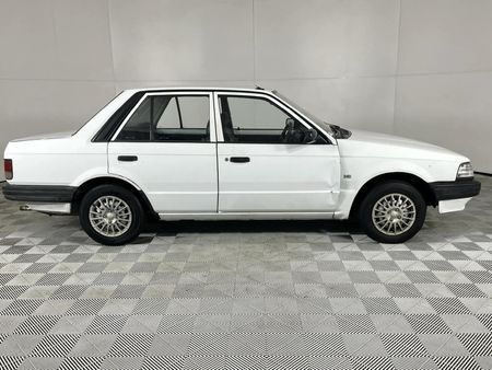 1996-Ford-Laser-13-Tracer-Sedan_5