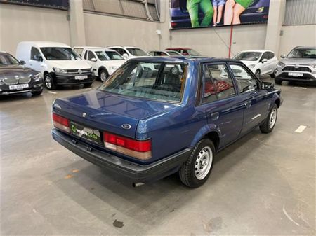 1996-Ford-Laser-13-Tracer-Sedan_2