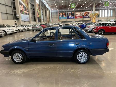 1996-Ford-Laser-13-Tracer-Sedan_5