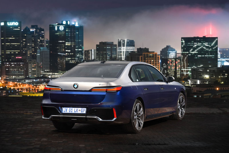 The BMW 7 Series (G70) rear three-quarter view. 2023 740i with dual-tone paint finish.