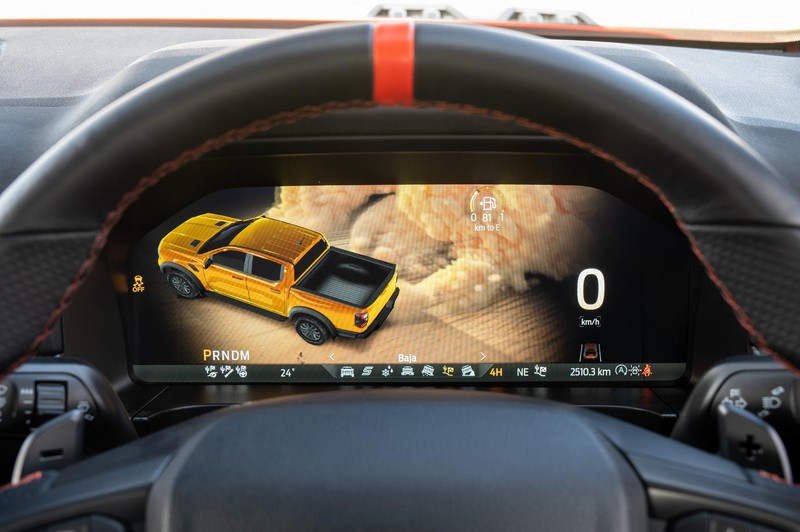Ford Ranger Raptor's fully digital instrument cluster with off-road graphic.