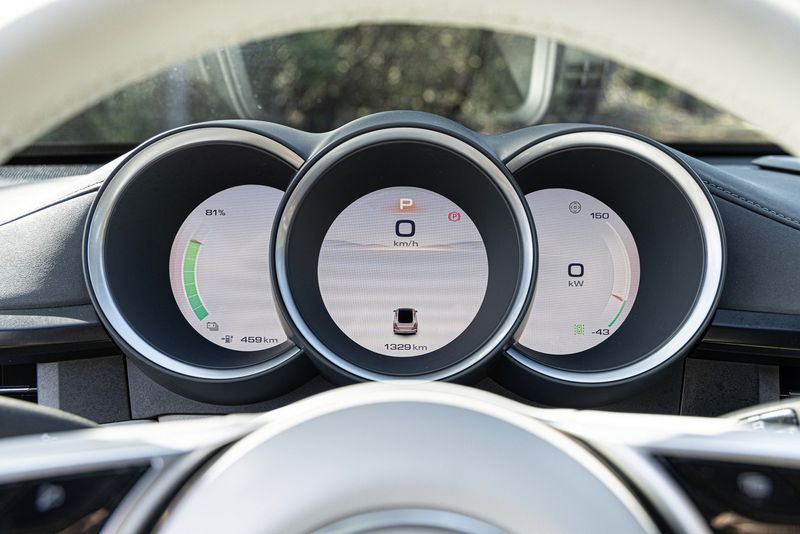 The tri-tubular design of the GWM Ora Sport's digital instrument cluster.