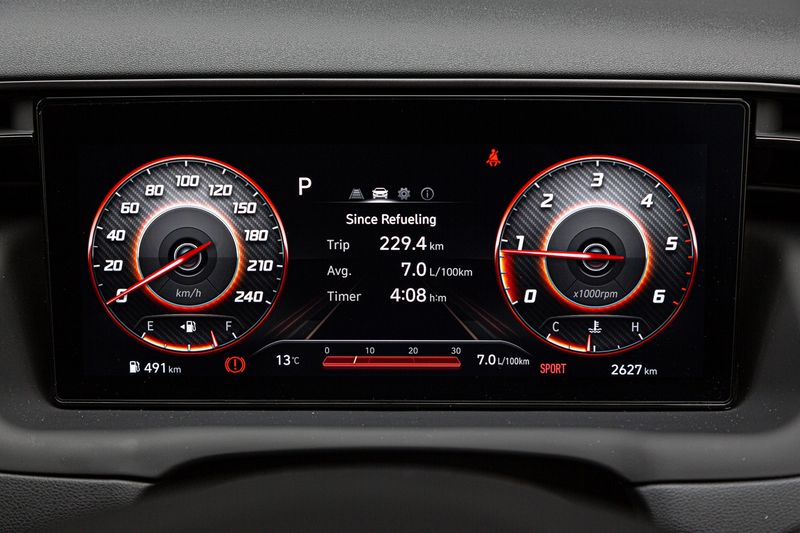Hyundai Tucson N Line has a digital instrument cluster that displays red accents when Sport mode is engaged.