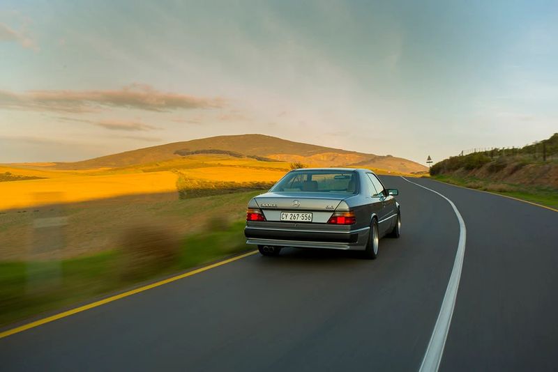 Mercedes-Benz 560CE rear tracking shot