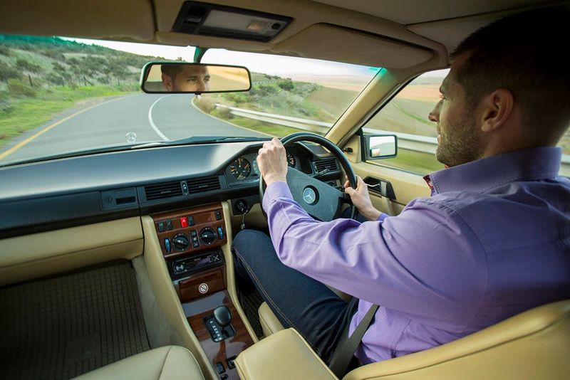 Behind the wheel of the Mercedes-Benz 560CE