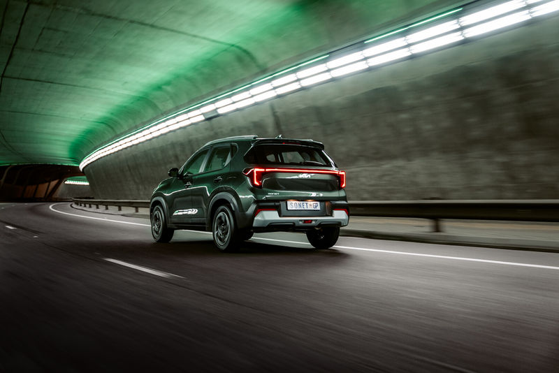 Facelifted Kia Sonet driving rear