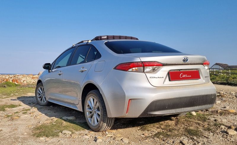 2024 Toyota Corolla Hybrid rear three-quarter view.