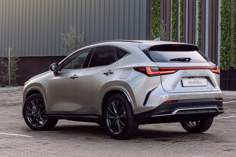 Lexus NX 450h+ F Sport rear three-quarter view.