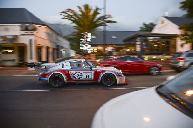 Martini Racing Porsche 911 Carrera RSR tribute car in early morning traffic