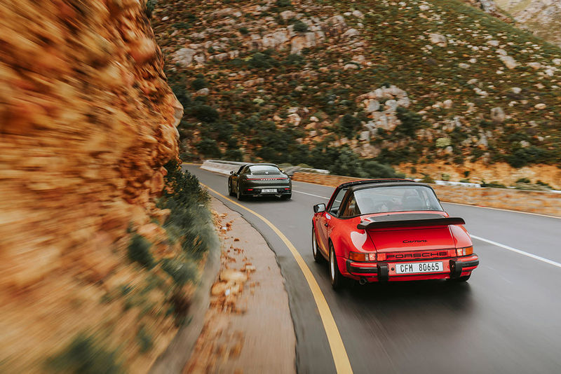 Porsche 911 Carrera 3.2 Targa (G-series) trails a modern Porsche 911 Targa 4
 
