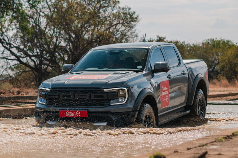 2025 CarsAwards Ultimate Double Cab finalist Ranger Raptor wading through a water obstacle