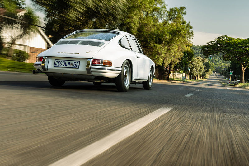 1965 Porsche 911 rear three-quarter view (tracking)