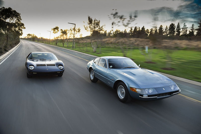 Ferrari Daytona (right) flanked by a Lamborghini Miura, front three-quarter tracking shot