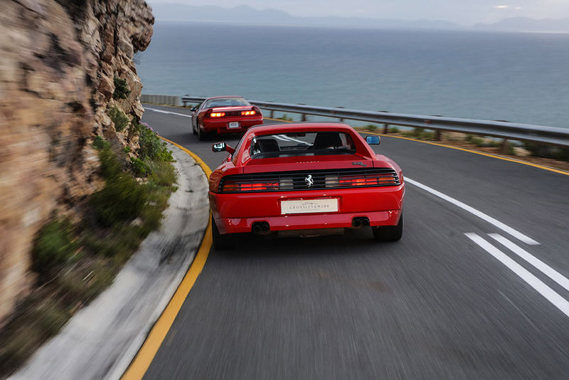 Ferrari 348 follows Honda NSX - rear tracking shot