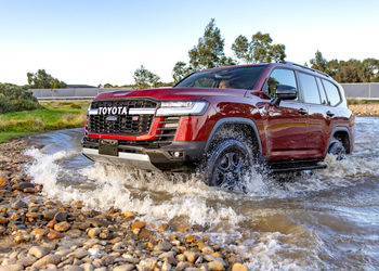 How does Toyota's new Land Cruiser 300 HEV compare to the diesel?